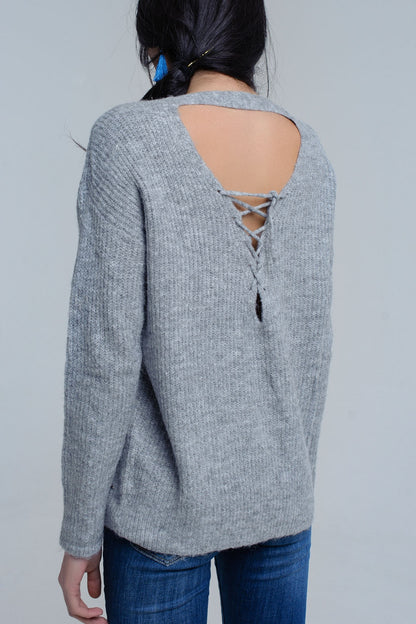 Gray knitted sweater with tie-back closure