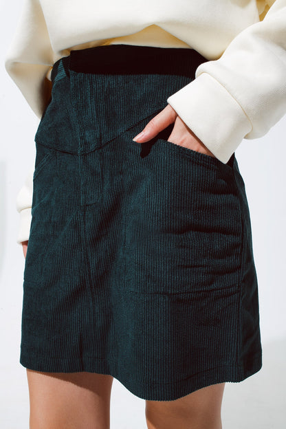 green corduroy miniskirt with pockets