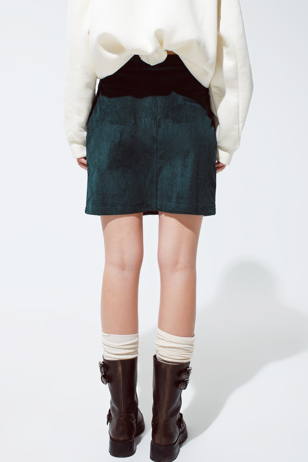 green corduroy miniskirt with pockets