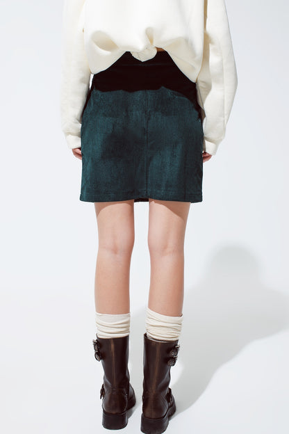 green corduroy miniskirt with pockets