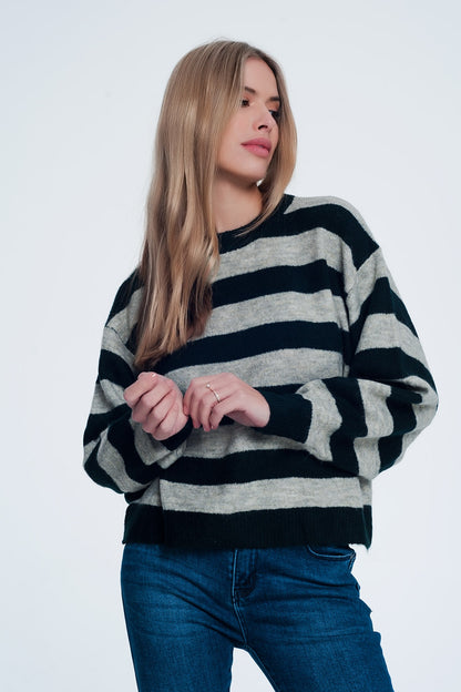 Green knitted sweater with grey stripes