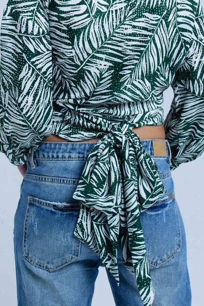 Green leaf print blouse with plunge neck