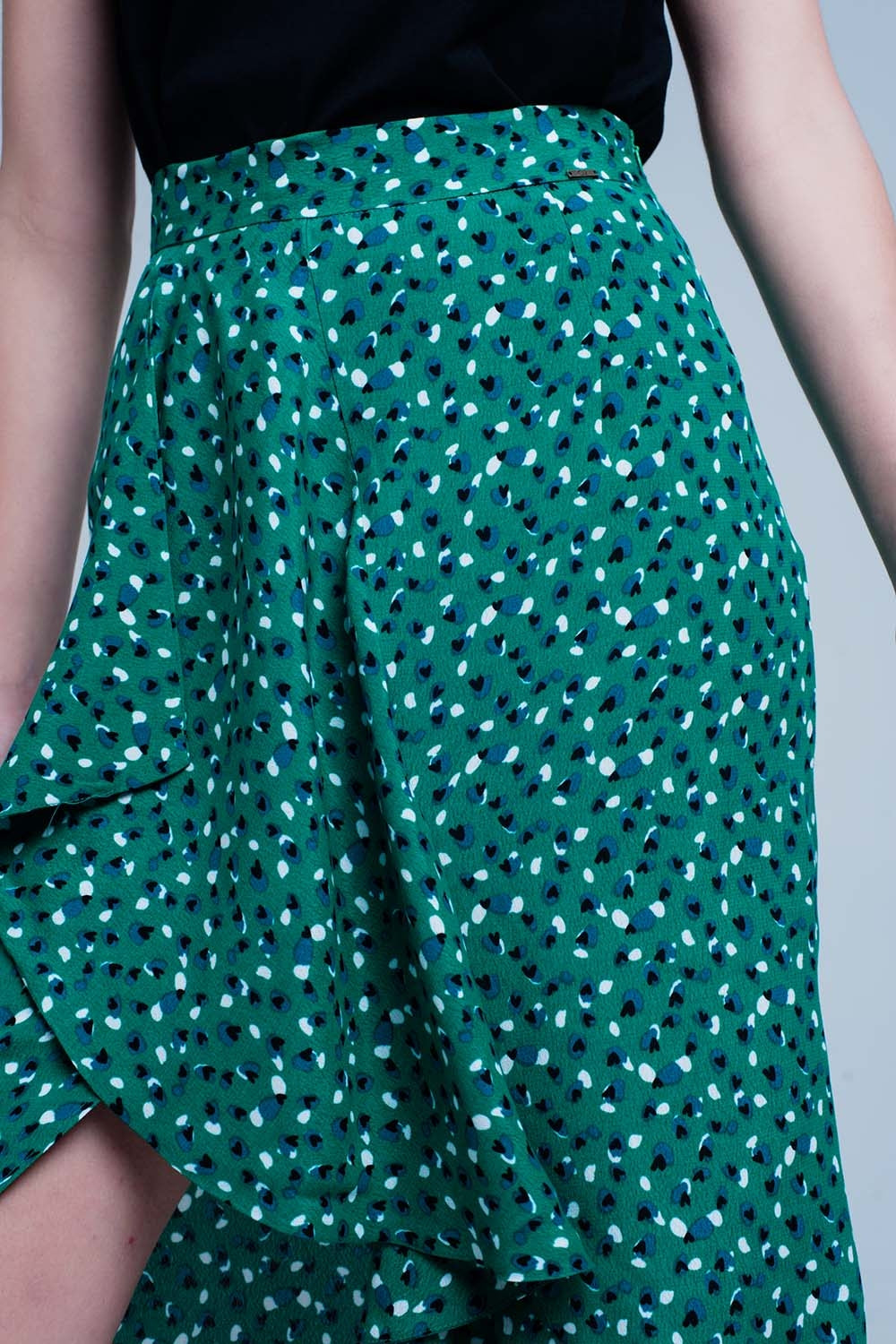 Green skirt with flower print