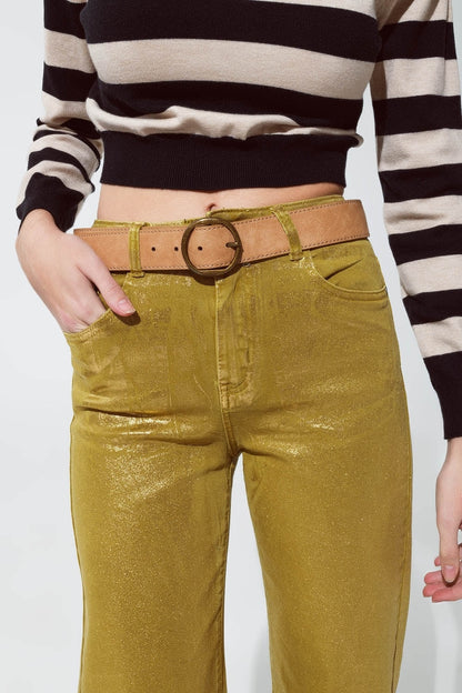 Green straight leg jeans with gold metallic glow