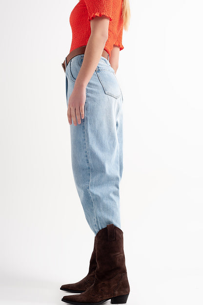 High rise relaxed jeans with pleat front in bleach wash