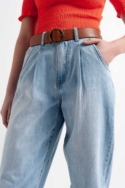 High rise relaxed jeans with pleat front in bleach wash