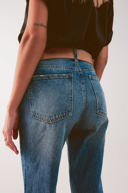 High waist jean with thigh slash in midblue