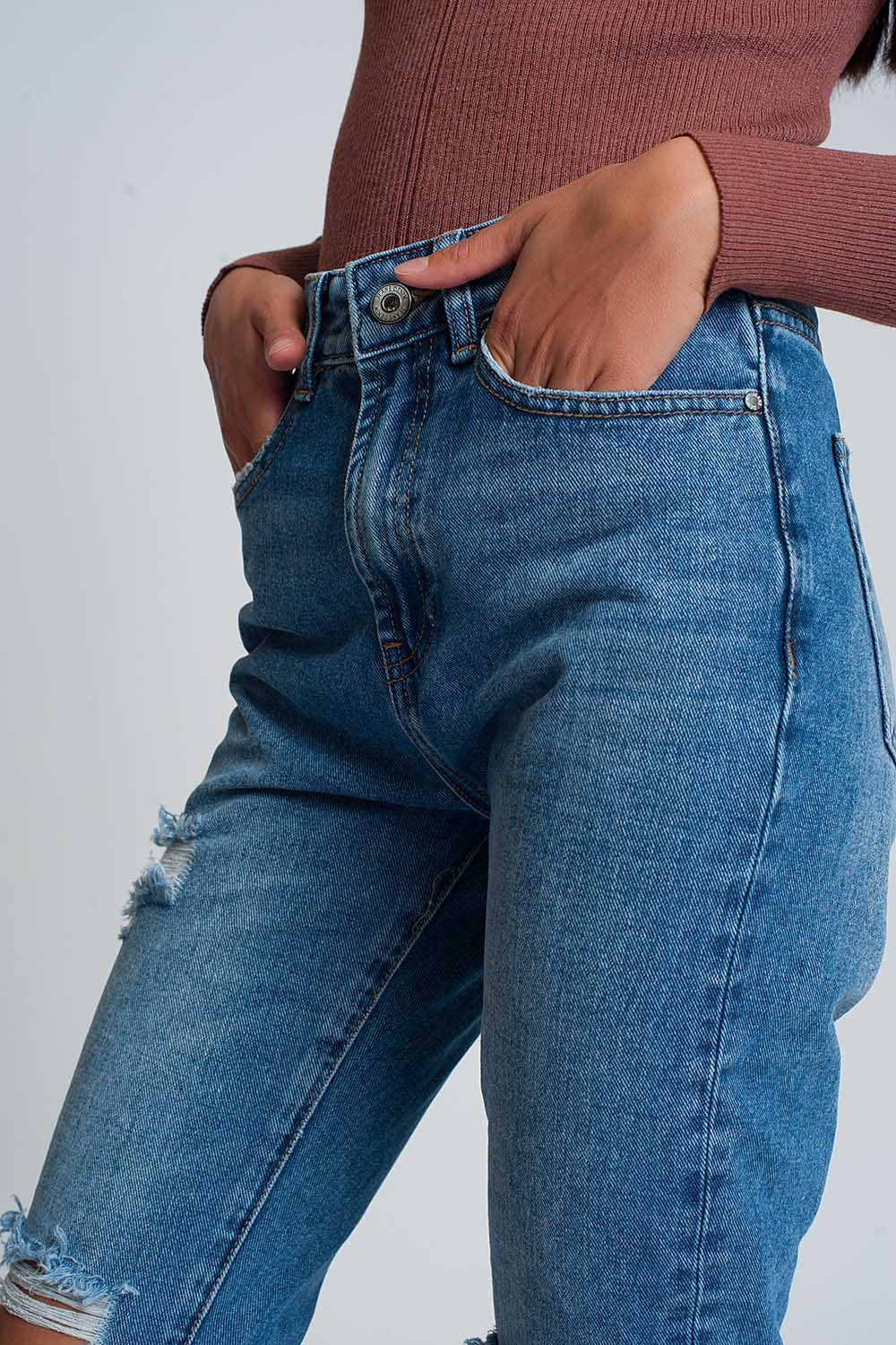 High waist mom jeans with ripped knees in dark wash blue