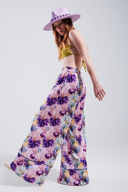 High waisted satin wide leg pants in purple floral