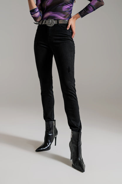 High waisted skinny jeans Distressed At The Hem in Black