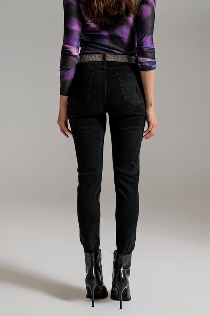 High waisted skinny jeans Distressed At The Hem in Black