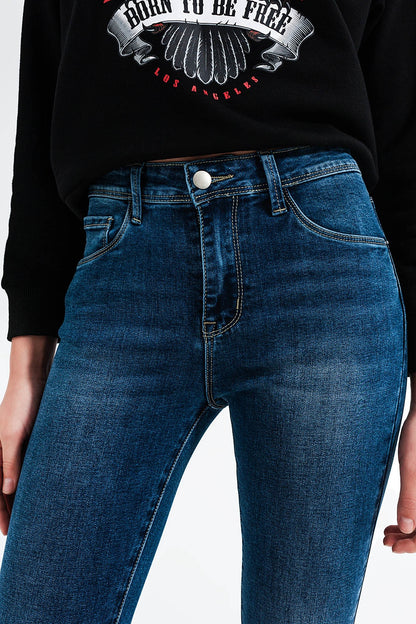 High waisted skinny jeans in mid blue