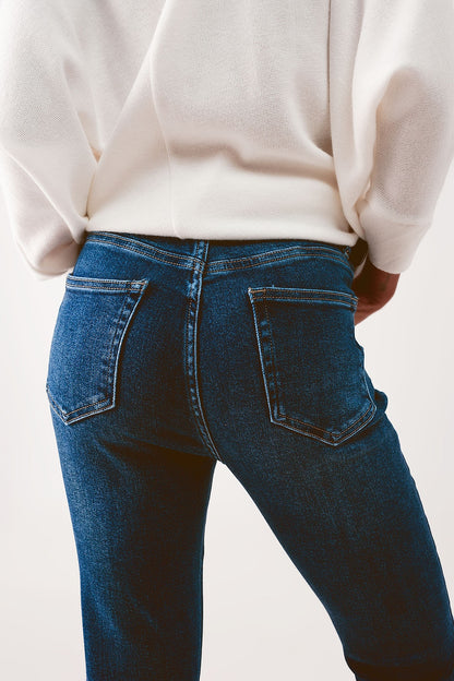 High waisted skinny jeans in mid wash