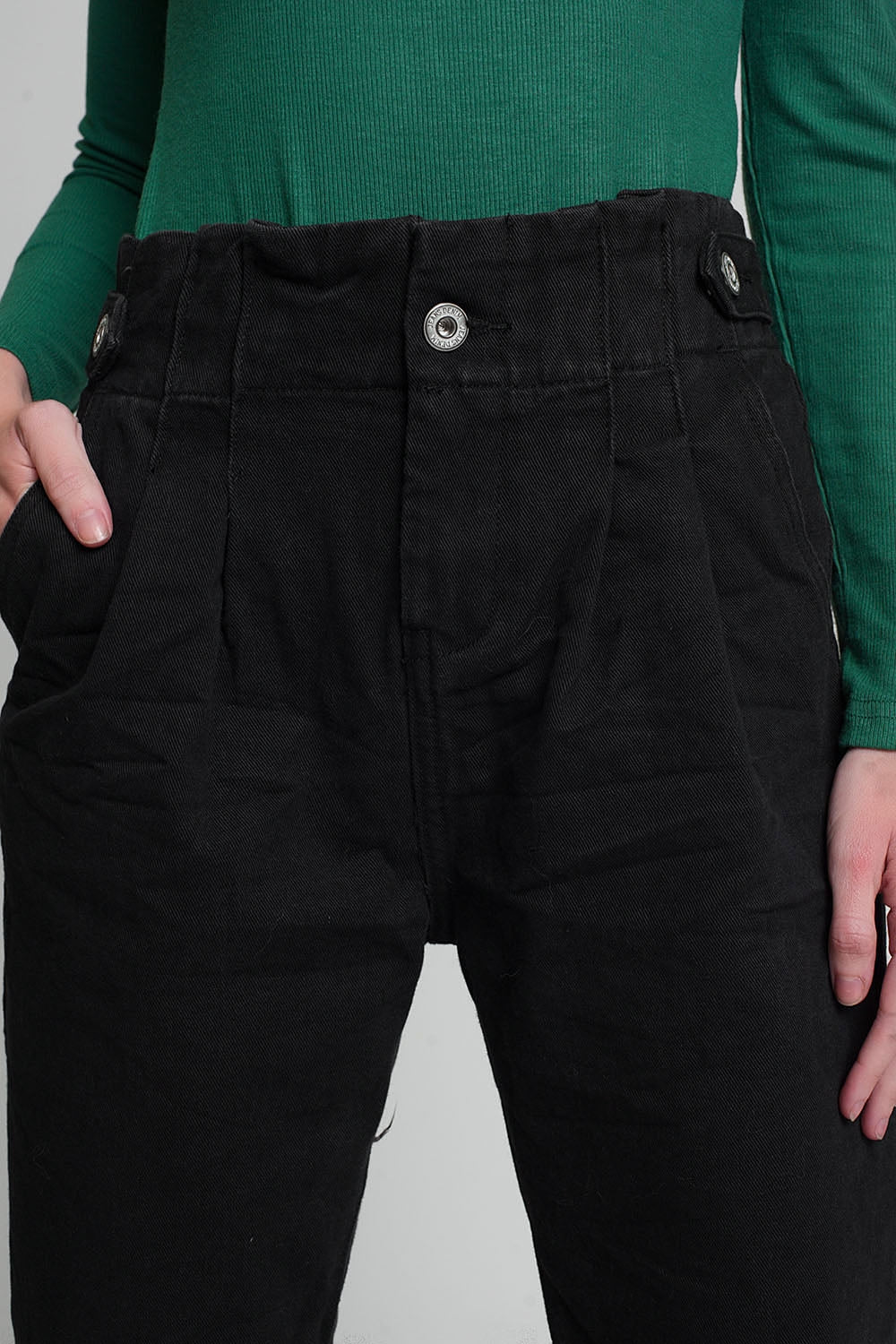 Jeans with paper bag waist and button details in black