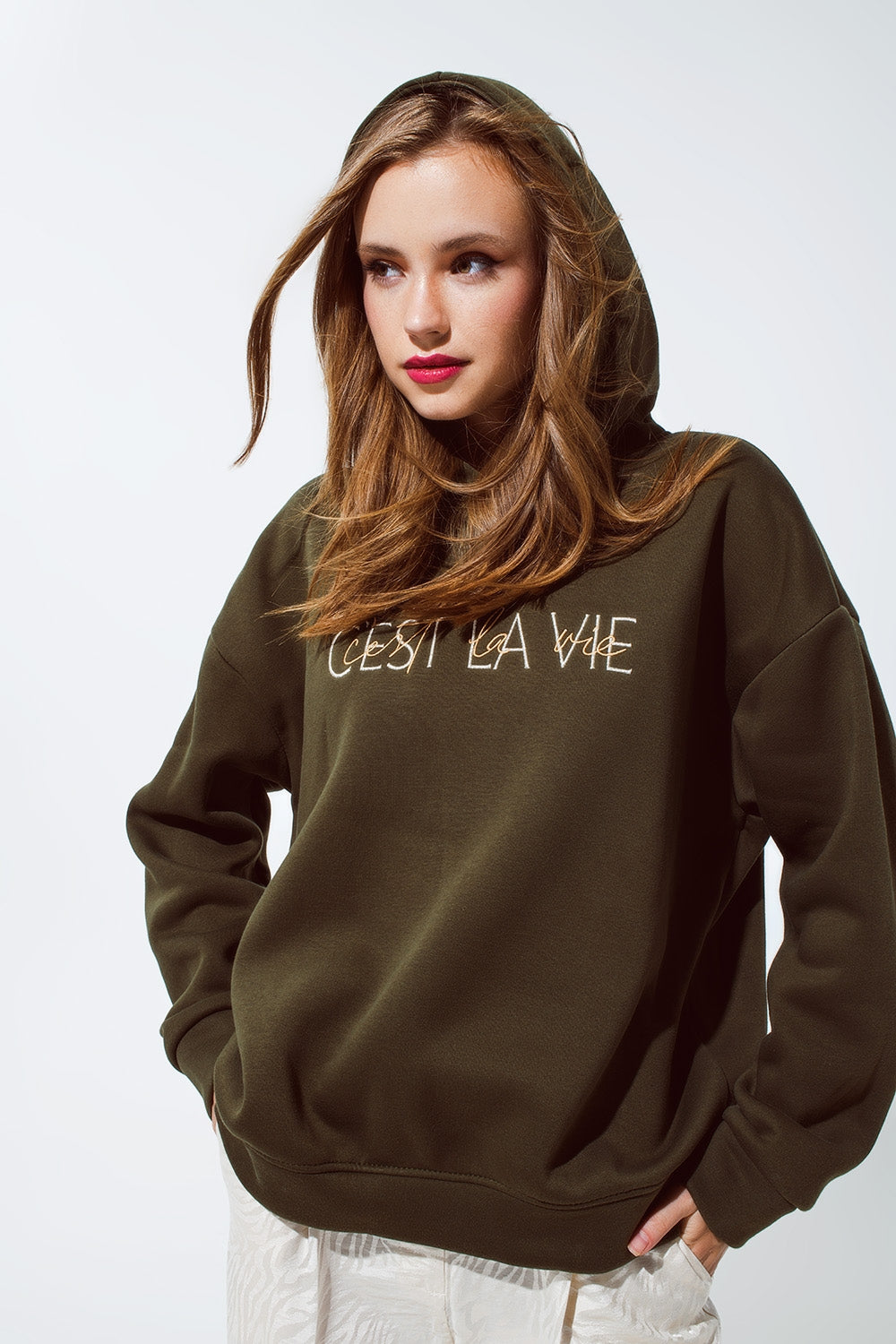 Khaki color hoodie with embroidered Cest La Vie text