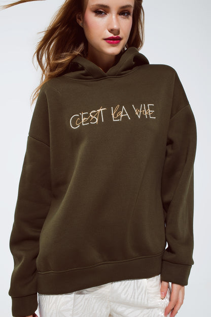 Khaki color hoodie with embroidered Cest La Vie text