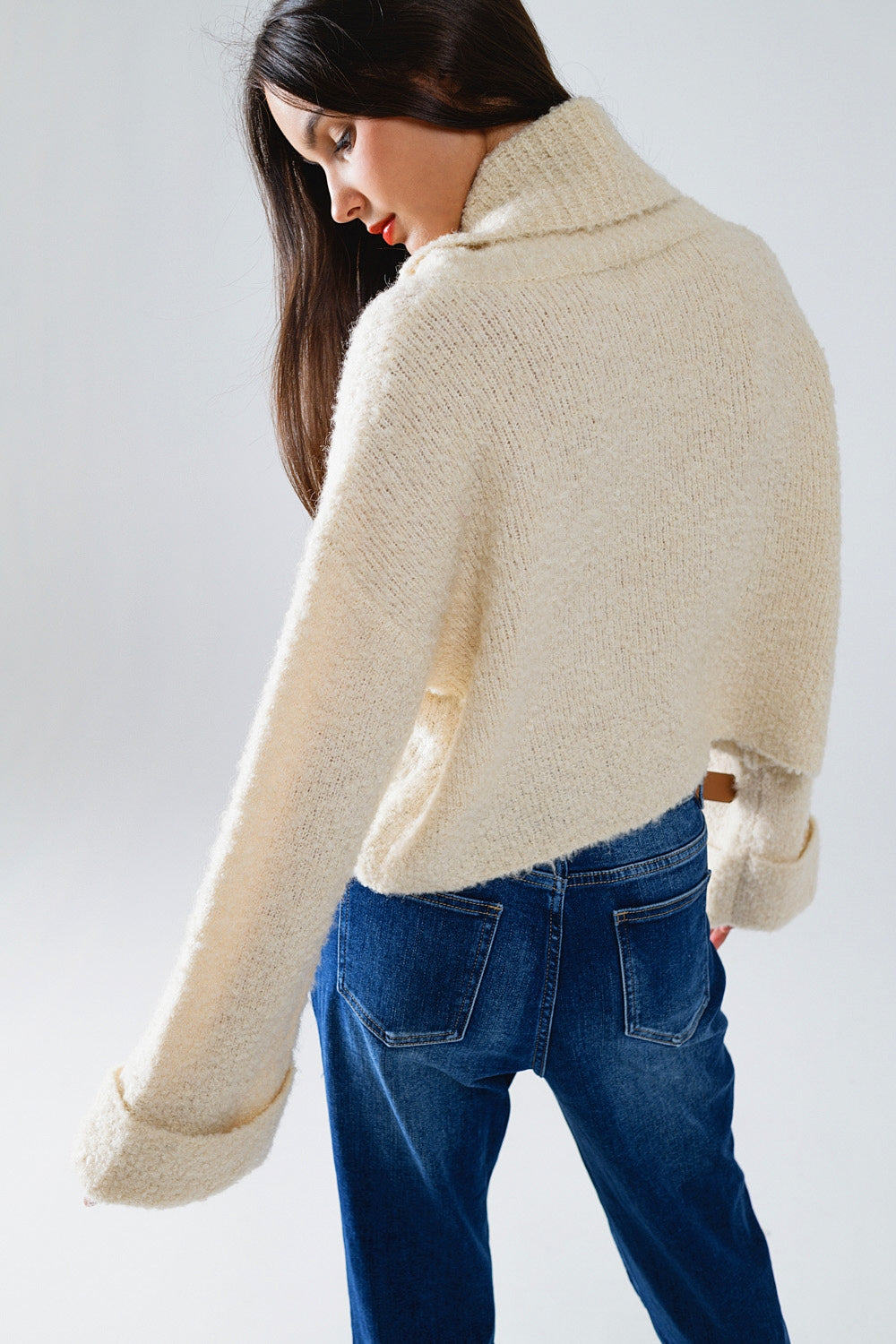 knitted fluffy high neck sweater in cream