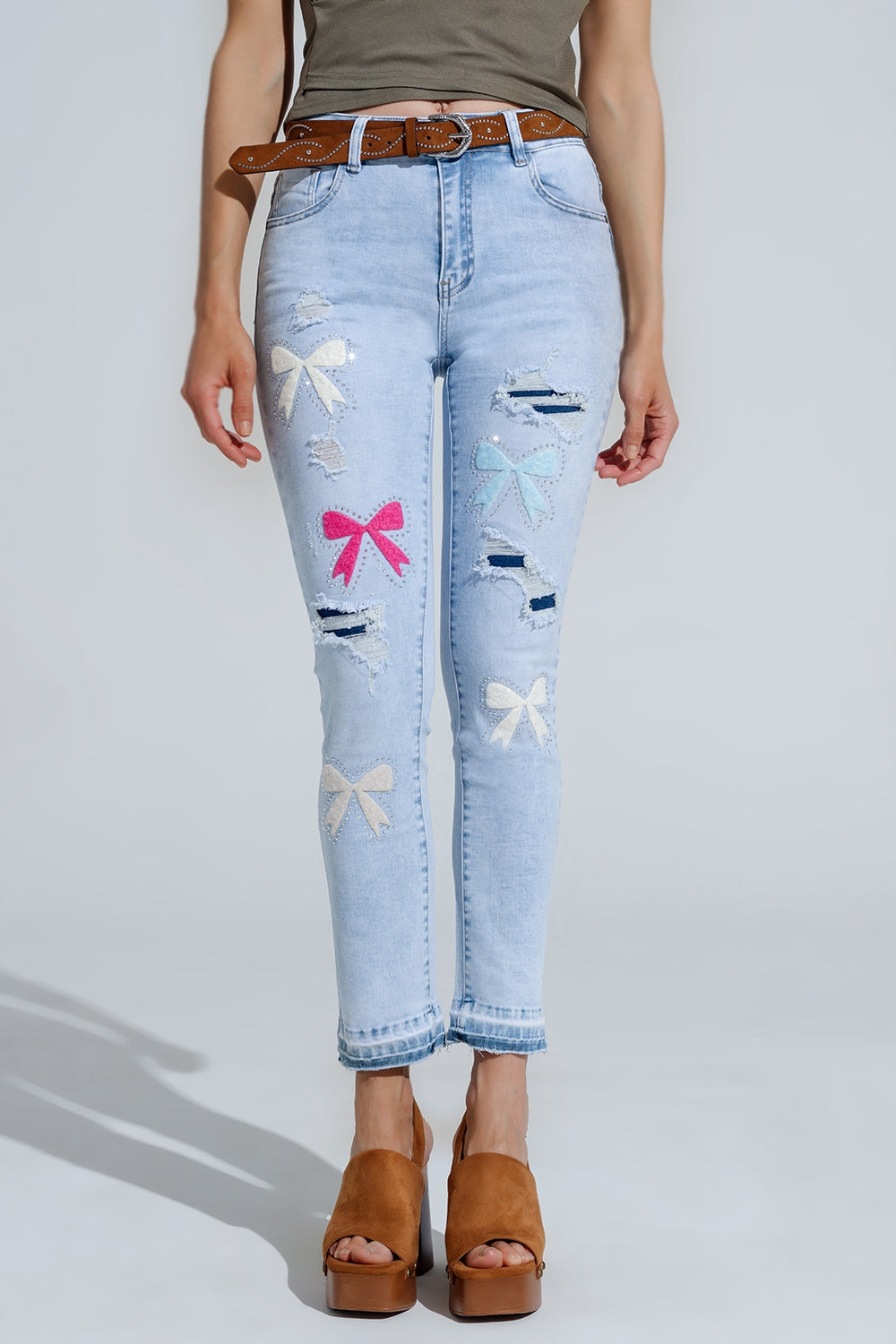 Q2 Light Blue super Skinny Jeans With Bow ties and Ripped Holes