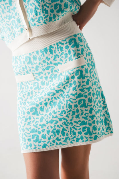 Lightweight knit mini skirt in turquoise animal print