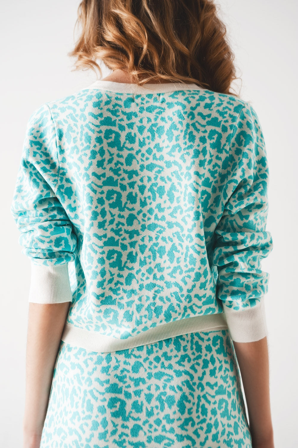 Lightweight knitted cardigan in turquoise animal print