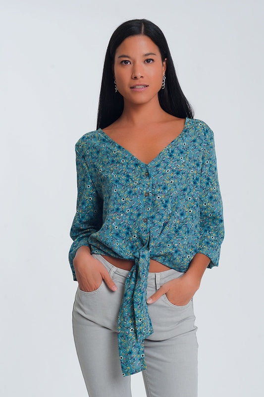 Q2 Long sleeve v neck blouse with button detail in green floral print