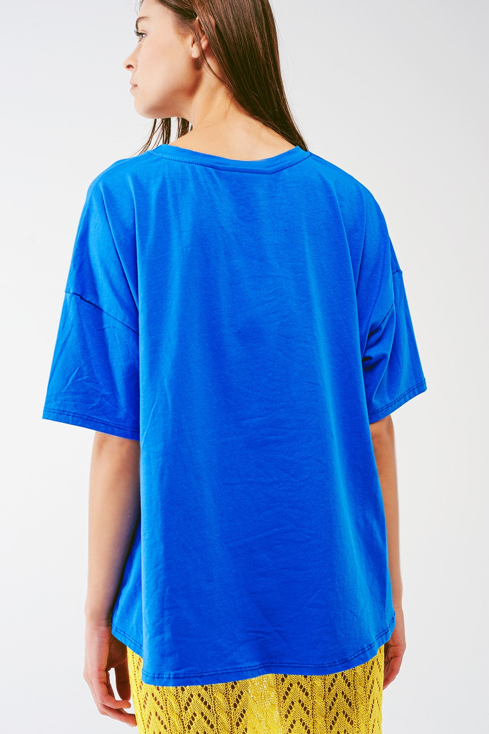 loose-fitting blue T-shirt with colored bear