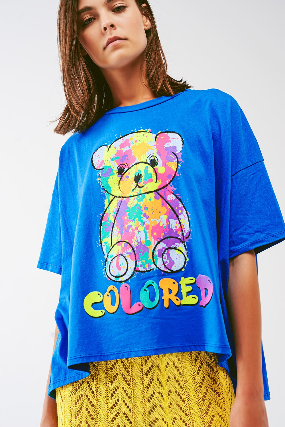 loose-fitting blue T-shirt with colored bear