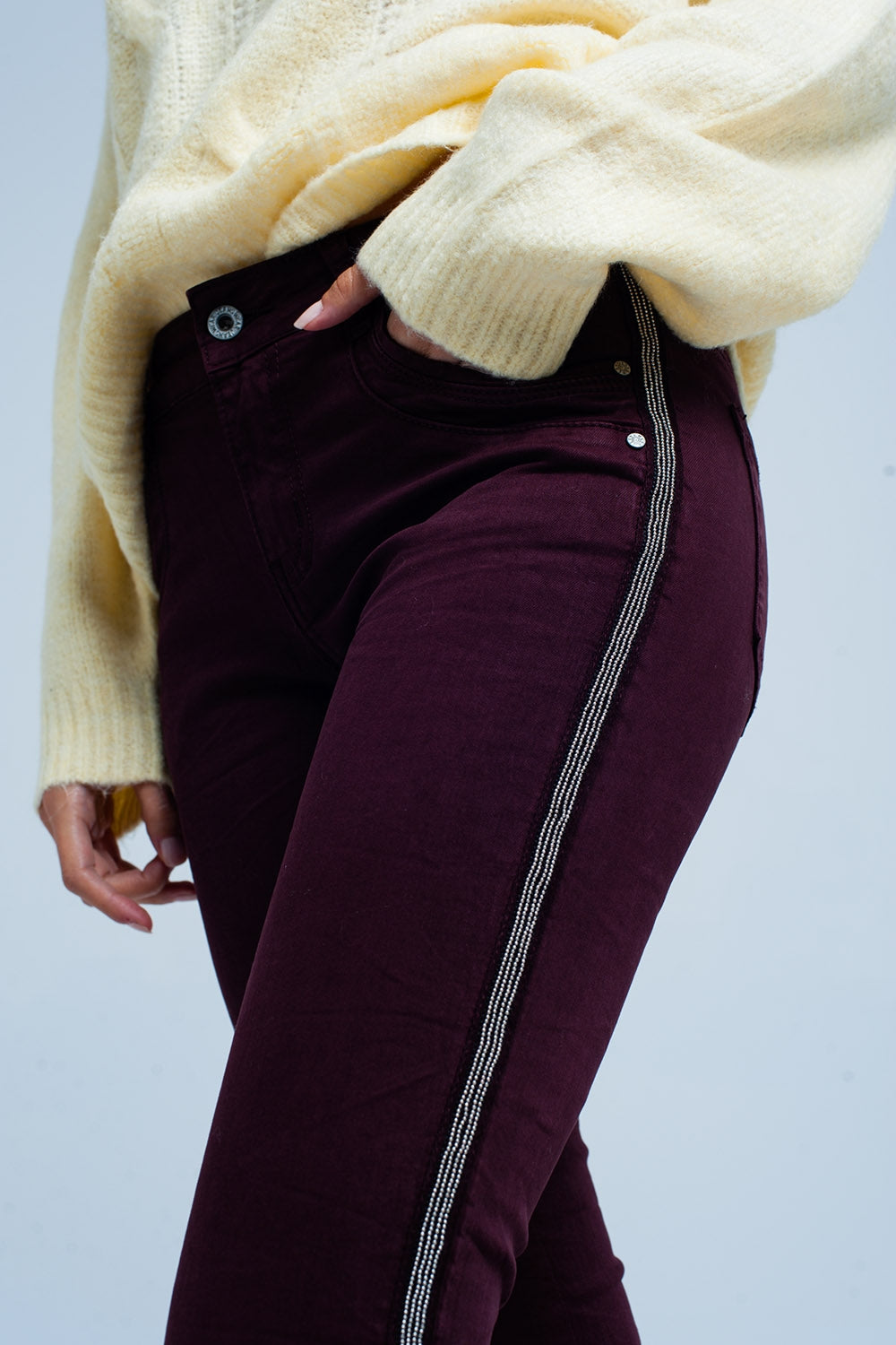 Q2 Maroon skinny jeans with metal side stripe