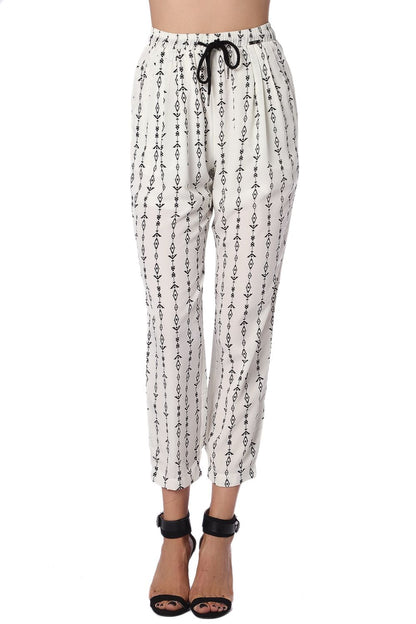 Q2 Cream pants with contrast geo-tribal print